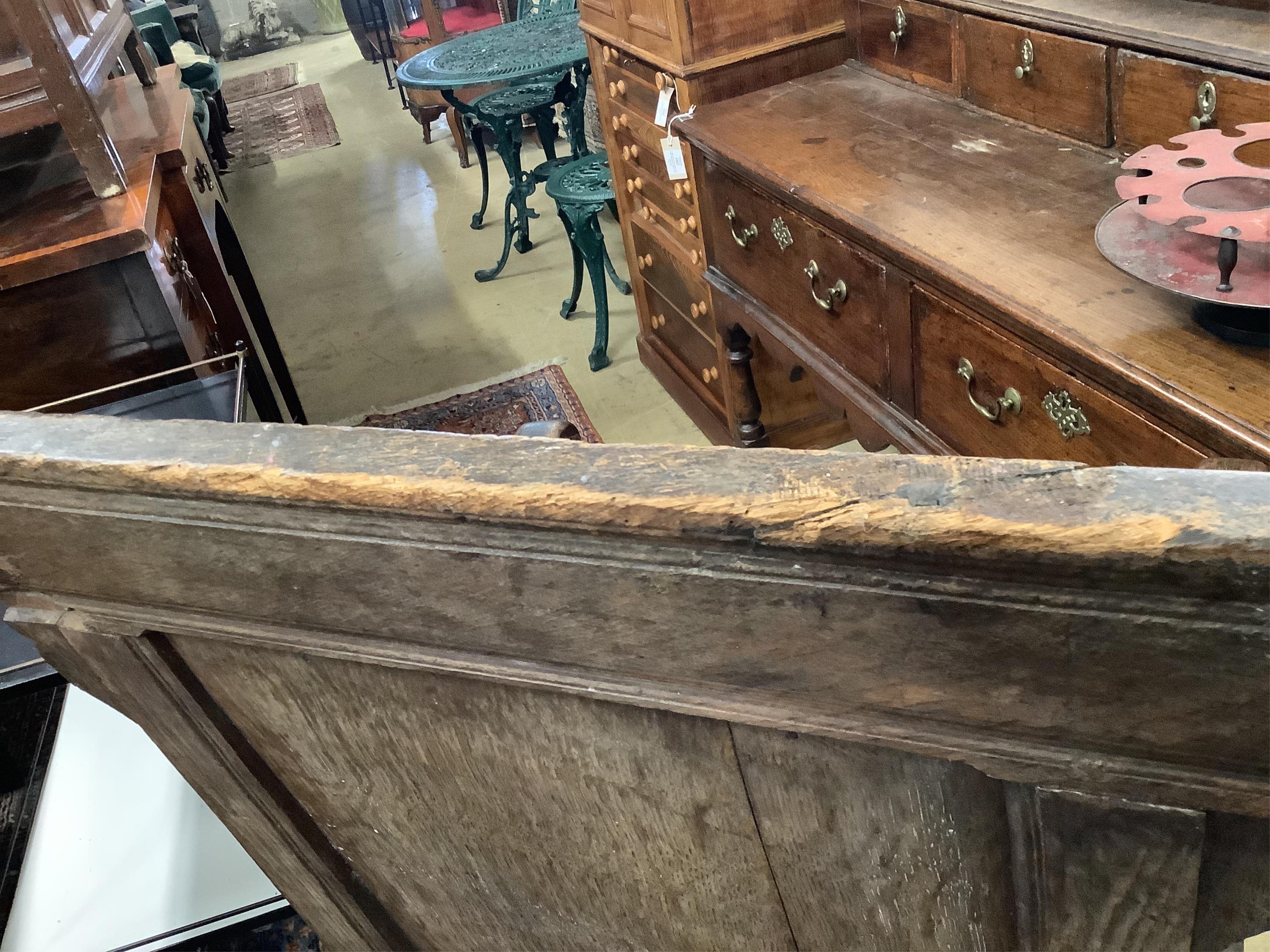 A 17th century oak wainscot type chair, width 61cm, depth 49cm, height 110cm. Condition - fair